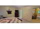 Bedroom featuring carpet flooring, a television, and access to the upstairs hallway at 3656 Homestead E Cir, Plainfield, IN 46168