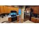 Kitchen with stainless steel appliances, oak cabinetry, and natural light at 3656 Homestead E Cir, Plainfield, IN 46168