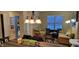 Inviting living room with comfortable seating and natural light from the window at 3656 Homestead E Cir, Plainfield, IN 46168