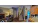 Inviting living room with fireplace and staircase leading to the upper level, offering a cozy atmosphere at 3656 Homestead E Cir, Plainfield, IN 46168