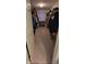 Spacious walk-in closet with ample storage for clothes and shoes with carpeted floor at 3656 Homestead E Cir, Plainfield, IN 46168