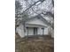 Cozy bungalow with covered porch and small yard at 4041 Boulevard Pl, Indianapolis, IN 46208