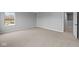 Bright bedroom with plush carpet and ample natural light, creating a serene retreat for rest and relaxation at 4171 Douro Trl, Westfield, IN 46062