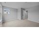 Bedroom with neutral carpet, a window, and an open doorway at 4171 Douro Trl, Westfield, IN 46062
