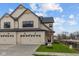 Beautiful townhome boasts a two-car garage and a well-maintained lawn at 4171 Douro Trl, Westfield, IN 46062