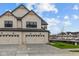 Lovely townhome featuring a two-car garage, landscaping and ample parking space at 4171 Douro Trl, Westfield, IN 46062
