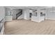 Spacious open-concept layout seamlessly connects the living room and kitchen, complete with modern appliances and ample counter space at 4171 Douro Trl, Westfield, IN 46062