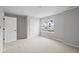 Spacious bedroom with carpet, a closet, and a window offering neighborhood views at 4195 Douro Trl, Westfield, IN 46062