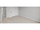 View of a bedroom area showing bi-fold doors, carpet flooring, and white trim at 4195 Douro Trl, Westfield, IN 46062