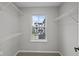 Walk-in closet with wire shelving providing organized storage solutions with a window at 4195 Douro Trl, Westfield, IN 46062
