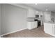 Bright, white kitchen featuring stainless steel appliances and quartz countertops at 4195 Douro Trl, Westfield, IN 46062