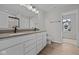 Bathroom featuring double sink vanity with black fixtures and tile flooring at 4205 Douro Trl, Westfield, IN 46062