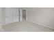 A bright bedroom with neutral walls, carpeted floors, and a closet at 4205 Douro Trl, Westfield, IN 46062