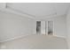 Bedroom featuring a tray ceiling and attached bathroom at 4205 Douro Trl, Westfield, IN 46062