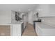 Modern kitchen boasts an island with a sink and stainless steel appliances at 4205 Douro Trl, Westfield, IN 46062