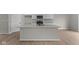 Well-equipped kitchen with modern appliances, an island with a sink, and ample counter space at 4205 Douro Trl, Westfield, IN 46062