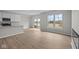 Open concept living space with lake views, hardwood floors and modern finishes at 4205 Douro Trl, Westfield, IN 46062