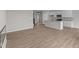 Spacious open concept living room with hardwood floors, kitchen and modern stair case at 4205 Douro Trl, Westfield, IN 46062