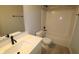 Bathroom featuring a shower-tub, quartz countertops, and tile floors at 4229 Douro Trl, Westfield, IN 46062