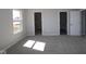 Cozy carpeted bedroom showcasing natural light, closet, and ensuite access at 4229 Douro Trl, Westfield, IN 46062