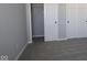A carpeted bedroom has access to a closet with sliding doors at 4229 Douro Trl, Westfield, IN 46062