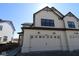 Charming home featuring light siding, dark trim, and a convenient two-car garage at 4229 Douro Trl, Westfield, IN 46062