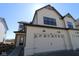 Charming home featuring light siding, dark trim, and a convenient two-car garage at 4229 Douro Trl, Westfield, IN 46062