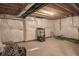 Unfinished basement with water softener at 453 Gathering Ln, Greenwood, IN 46143