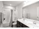 Modern bathroom with double vanity and shower/tub combo at 453 Gathering Ln, Greenwood, IN 46143