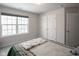 Cozy bedroom with a queen bed and ample closet space at 453 Gathering Ln, Greenwood, IN 46143