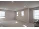 Spacious bedroom with neutral walls, carpeting, and multiple windows at 453 Gathering Ln, Greenwood, IN 46143