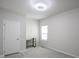 Simple bedroom with carpeted floors and a desk at 453 Gathering Ln, Greenwood, IN 46143