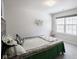 Spacious bedroom with a double bed and large window at 453 Gathering Ln, Greenwood, IN 46143