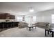 Open floor plan with modern kitchen and comfortable living area at 453 Gathering Ln, Greenwood, IN 46143