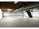 Unfinished basement with high ceilings and exposed beams at 4575 Ayrshire St, Indianapolis, IN 46228