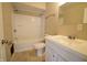 Bathroom with shower/tub combo, sink, and vanity at 4575 Ayrshire St, Indianapolis, IN 46228