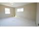 Bright bedroom featuring neutral walls and painted floors at 4575 Ayrshire St, Indianapolis, IN 46228