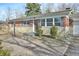 Brick ranch home with attached garage and paver patio at 4575 Ayrshire St, Indianapolis, IN 46228