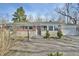 Brick ranch home with attached garage and paver driveway at 4575 Ayrshire St, Indianapolis, IN 46228