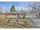 Brick ranch home with attached garage and paver walkway at 4575 Ayrshire St, Indianapolis, IN 46228