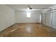 Attached garage with overhead door and concrete floor at 4575 Ayrshire St, Indianapolis, IN 46228