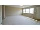 Bright living room with hardwood floors and neutral walls at 4575 Ayrshire St, Indianapolis, IN 46228