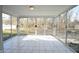 Bright sunroom with sliding glass doors and backyard view at 4575 Ayrshire St, Indianapolis, IN 46228