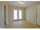 Sunroom with tiled floor and glass walls at 4575 Ayrshire St, Indianapolis, IN 46228