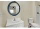 Clean bathroom featuring a white vanity, a toilet, and a shower at 4632 Normal Ave, Indianapolis, IN 46226