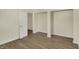 Empty bedroom boasts new floors and closet in the corner at 4632 Normal Ave, Indianapolis, IN 46226