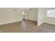 Bright living room with hardwood floors, a ceiling fan, and an open layout at 4632 Normal Ave, Indianapolis, IN 46226