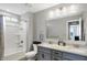 Clean bathroom with tub shower, double vanity at 6559 Seabiscuit Rd, Whitestown, IN 46075