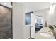 Modern bathroom with a large walk-in shower and double vanity at 6559 Seabiscuit Rd, Whitestown, IN 46075