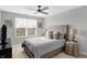 Cozy bedroom with neutral decor and window blinds at 6559 Seabiscuit Rd, Whitestown, IN 46075